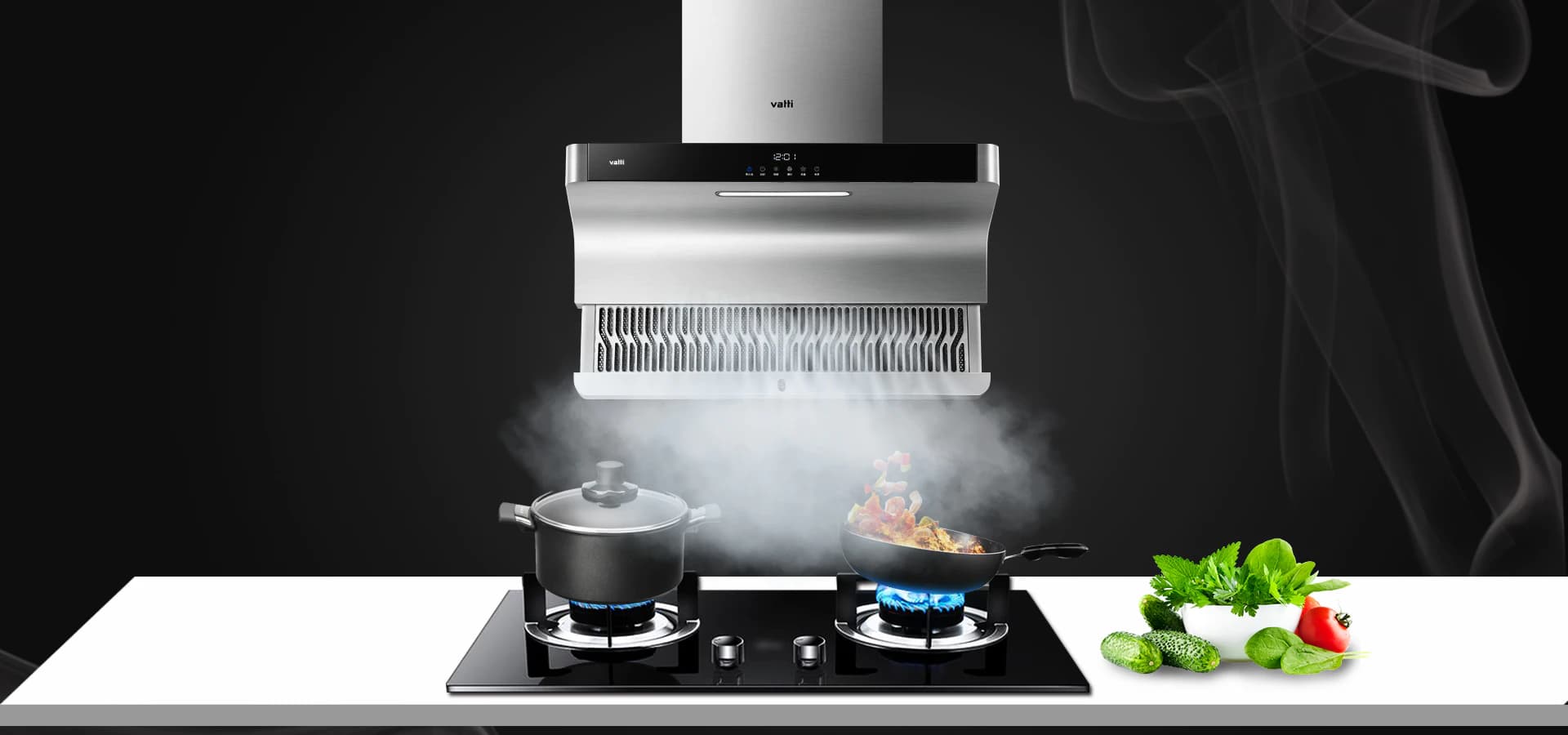 The V993 running over a gas hob, clearing smoke from a wok and a stockpot