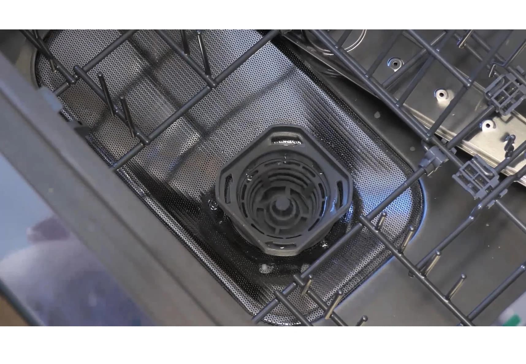 The DWID3 filter seated in the floor of the tub